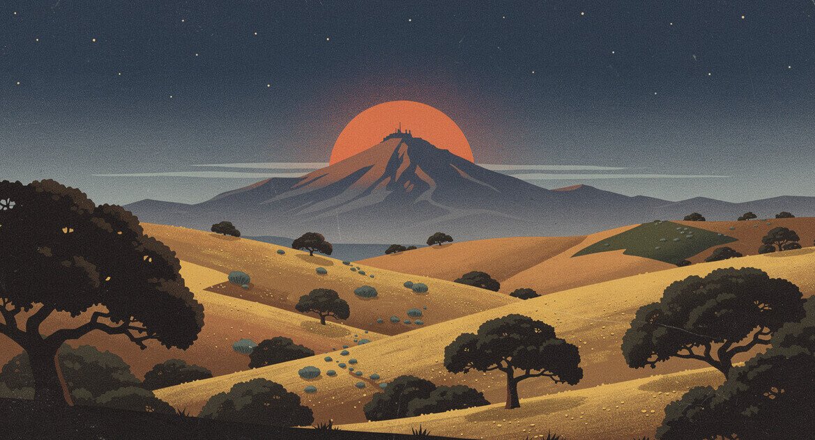 Mount Diablo's summit glowing at sunset above golden foothills